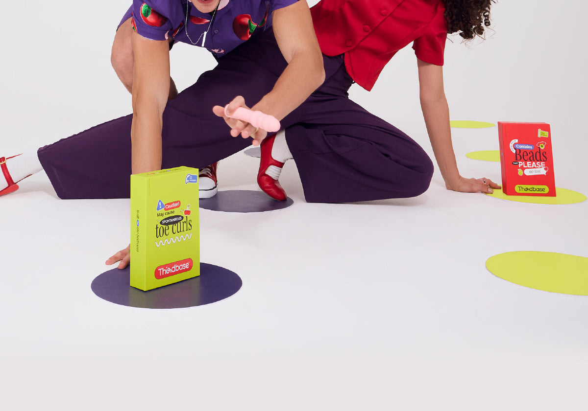 A couple playing with vibrators