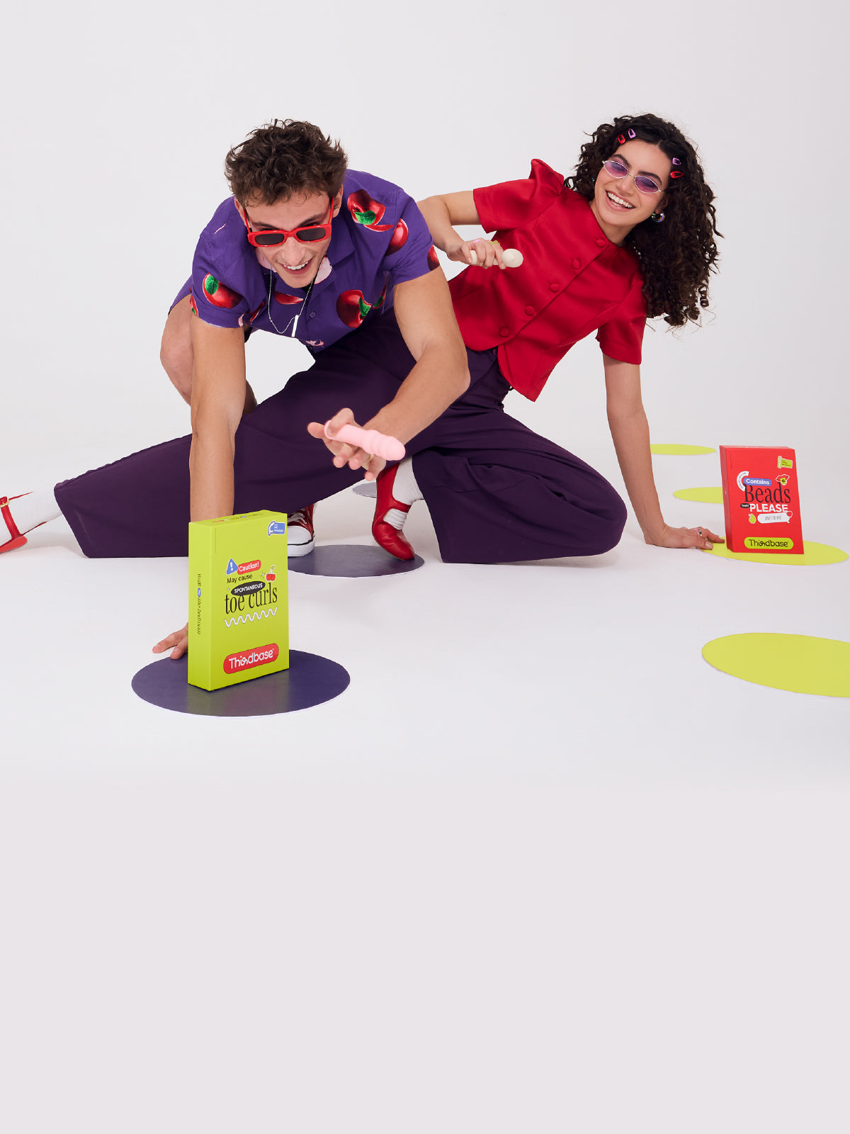 A couple playing with vibrators
