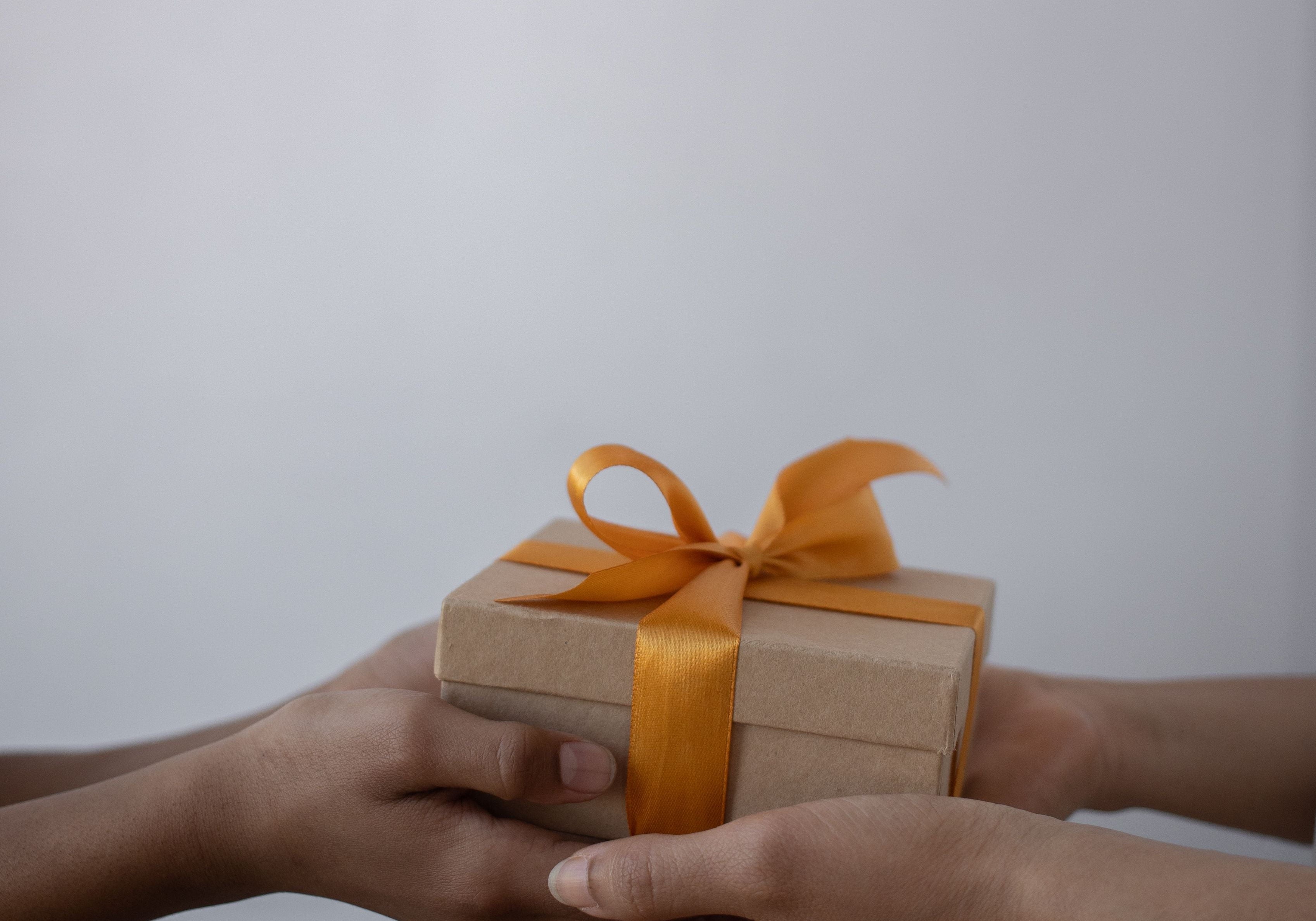 A couple exchanging an intimate gift 